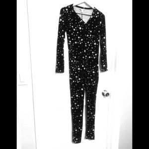 Onesie! Light fabric and has buttons!